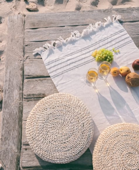 a woven basket with flowers