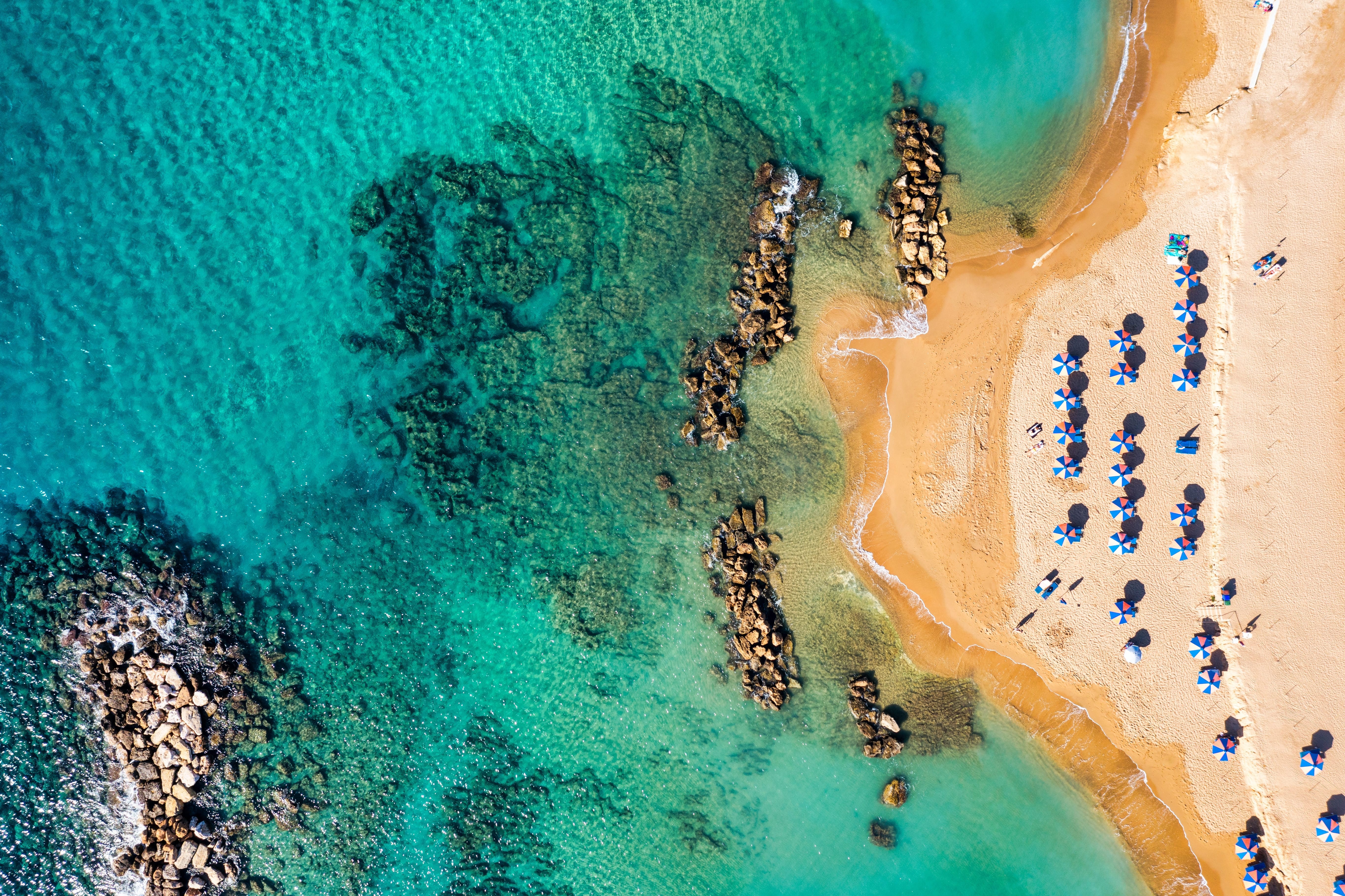 Family Eating Together Coral Bay is a popular and lively beach located near Paphos.