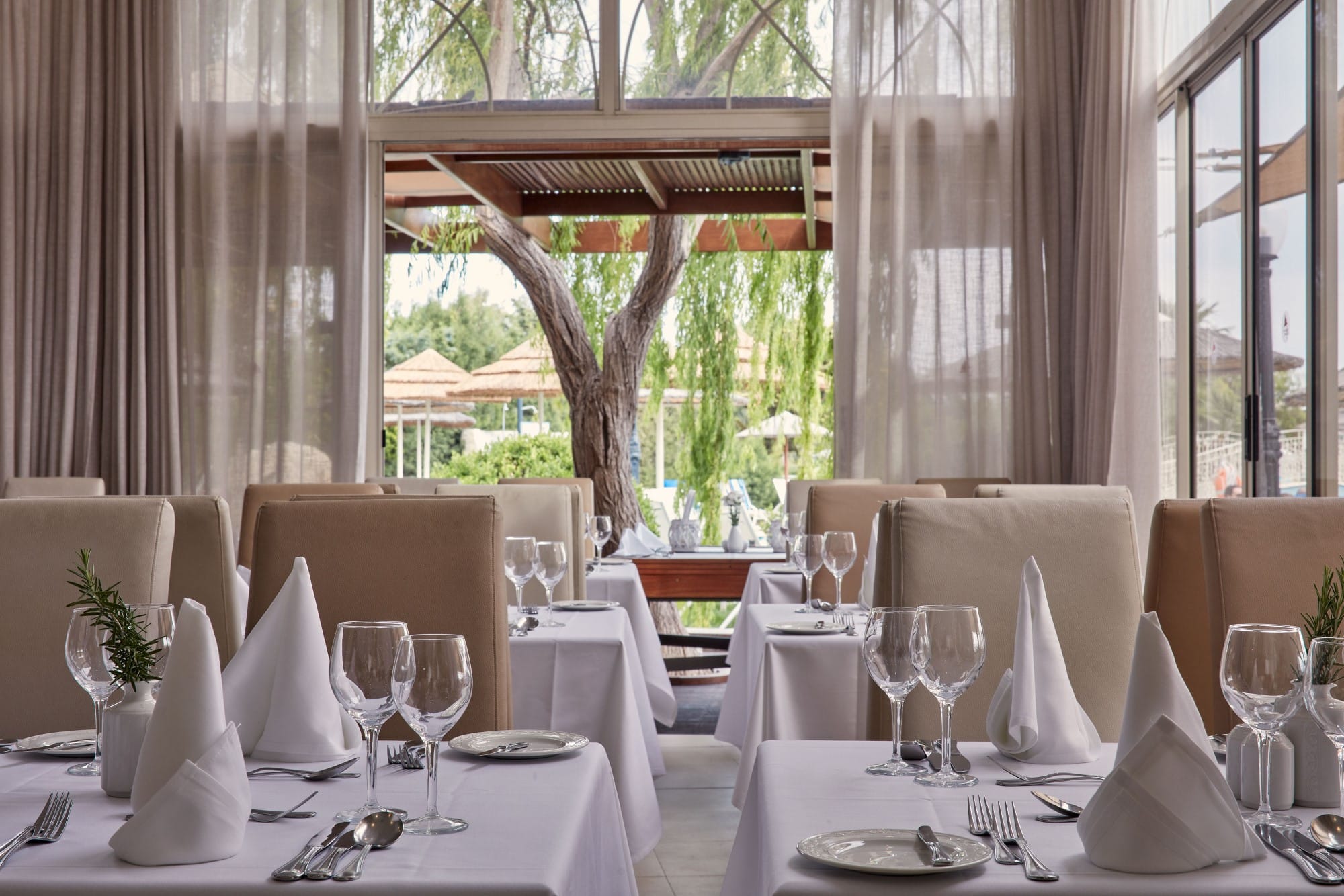 a table set with glasses and plates