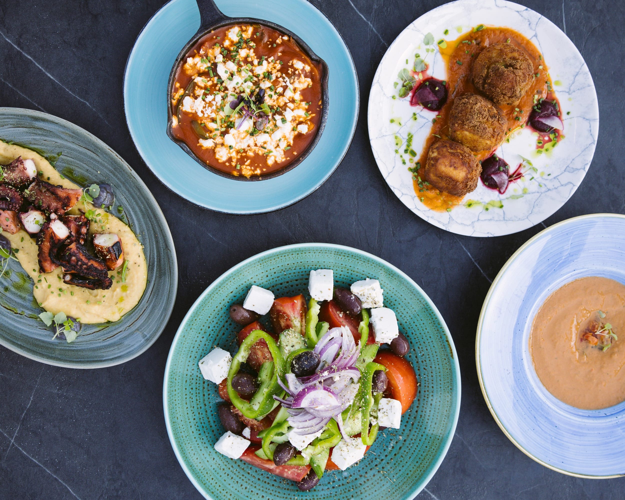 a table full of plates of food