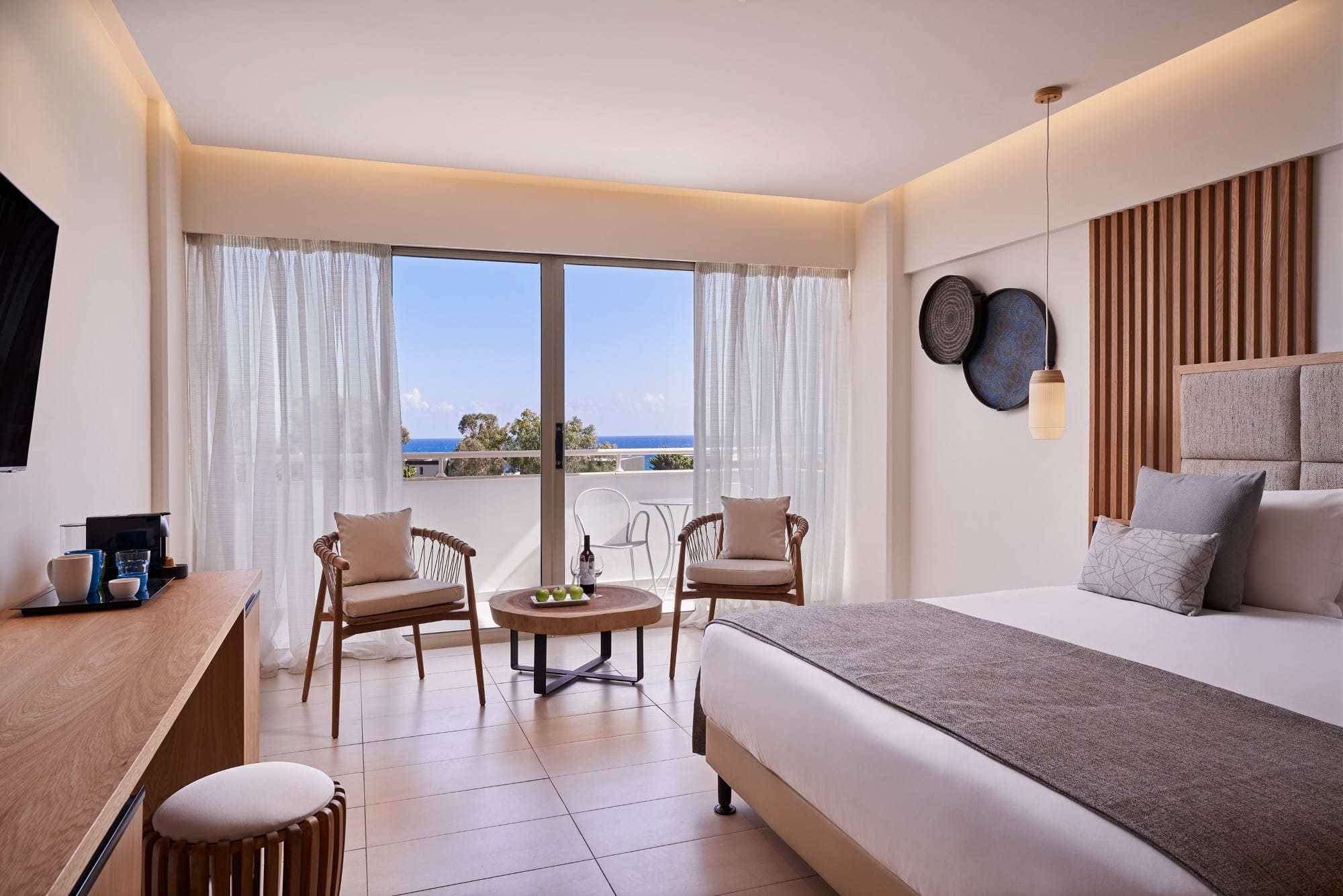 a bedroom with a large window