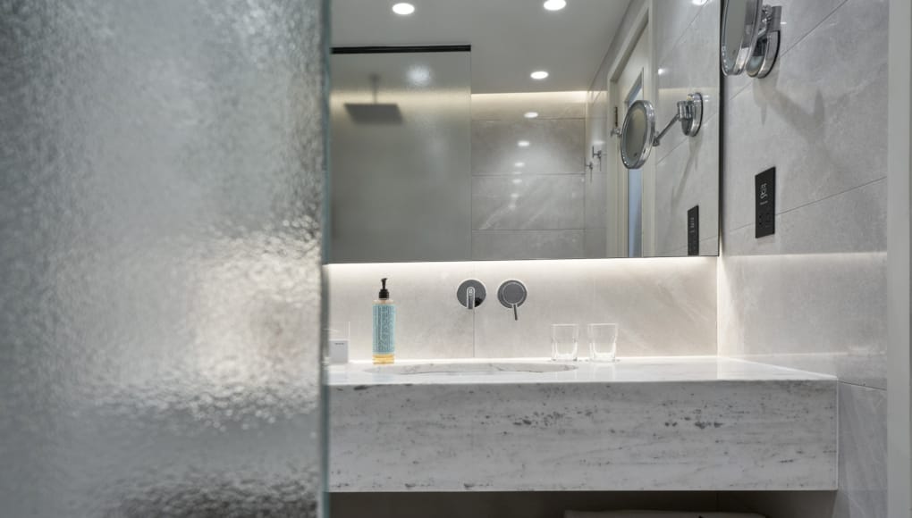 a bathroom with a glass shower