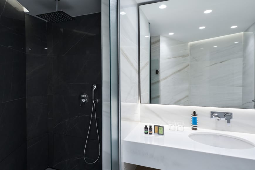 a bathroom with a glass shower