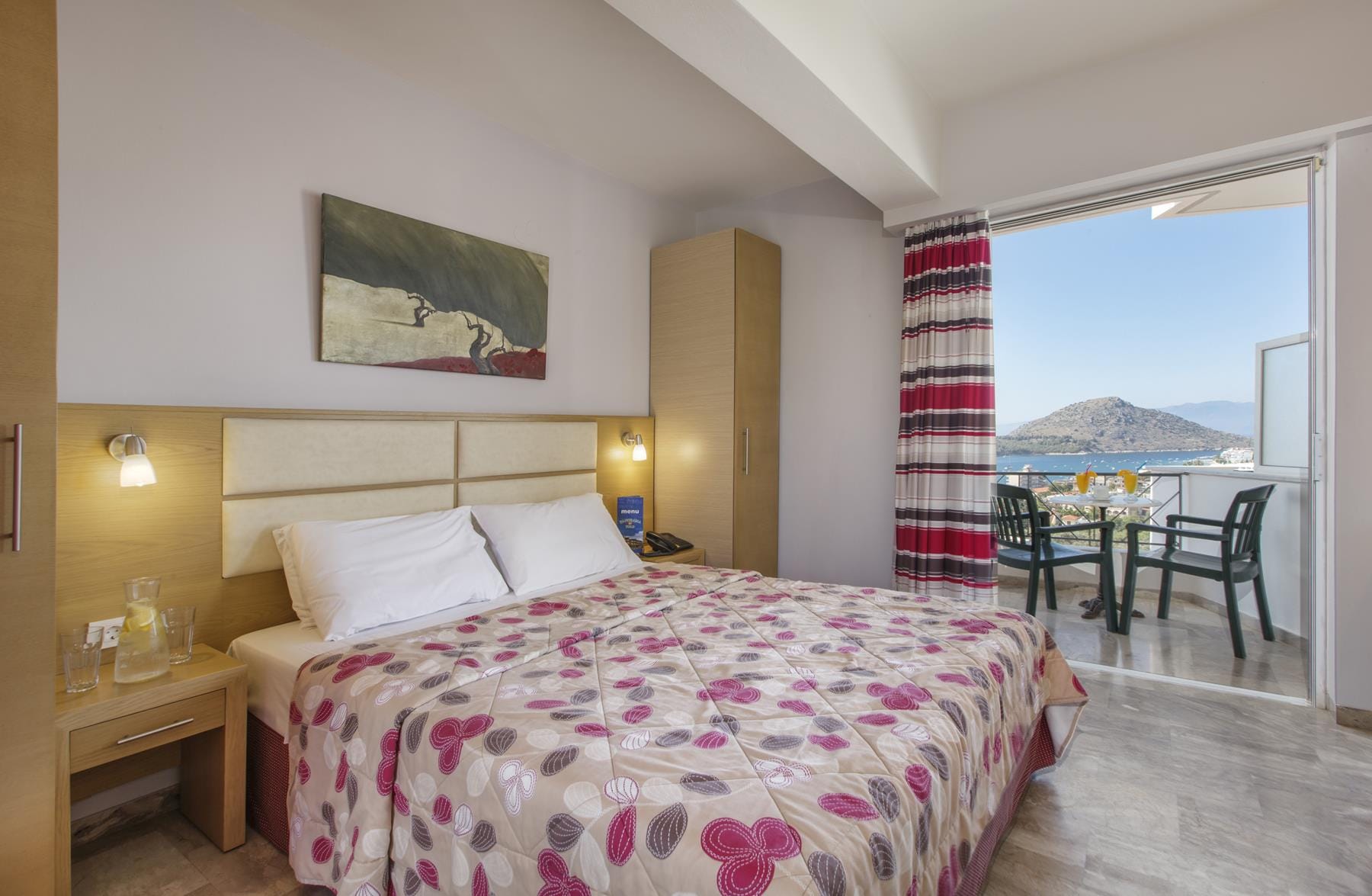 a bedroom with a large window