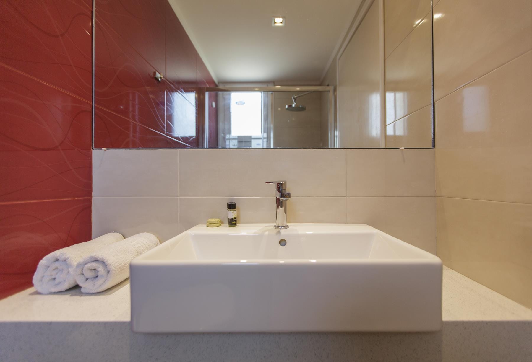 a bathroom with a large mirror