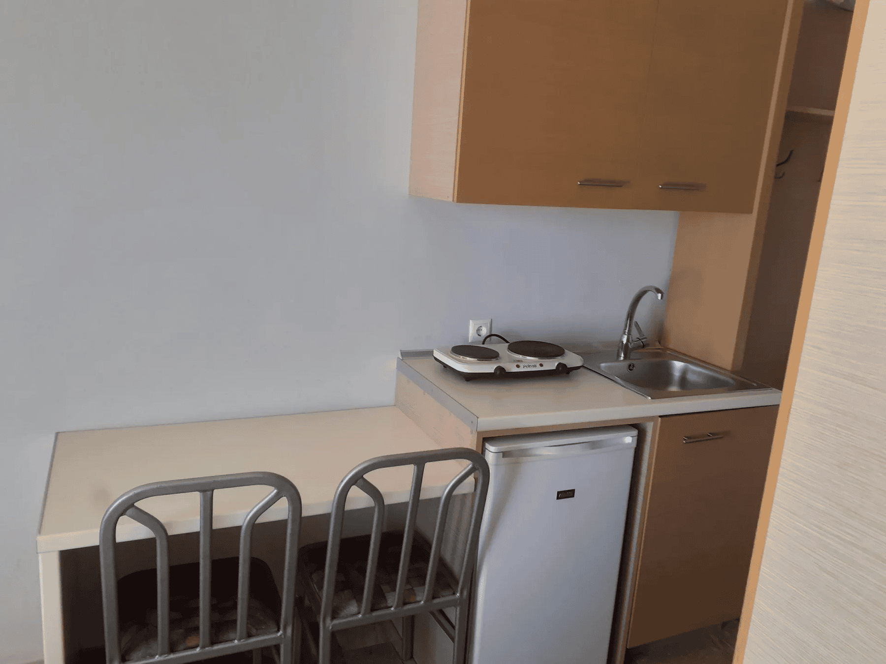 a kitchen with a sink and a dishwasher