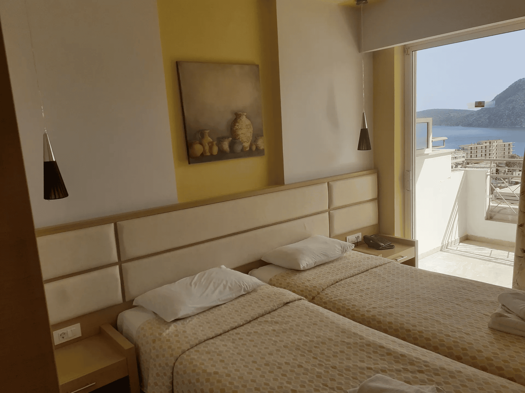 a bedroom with a large window