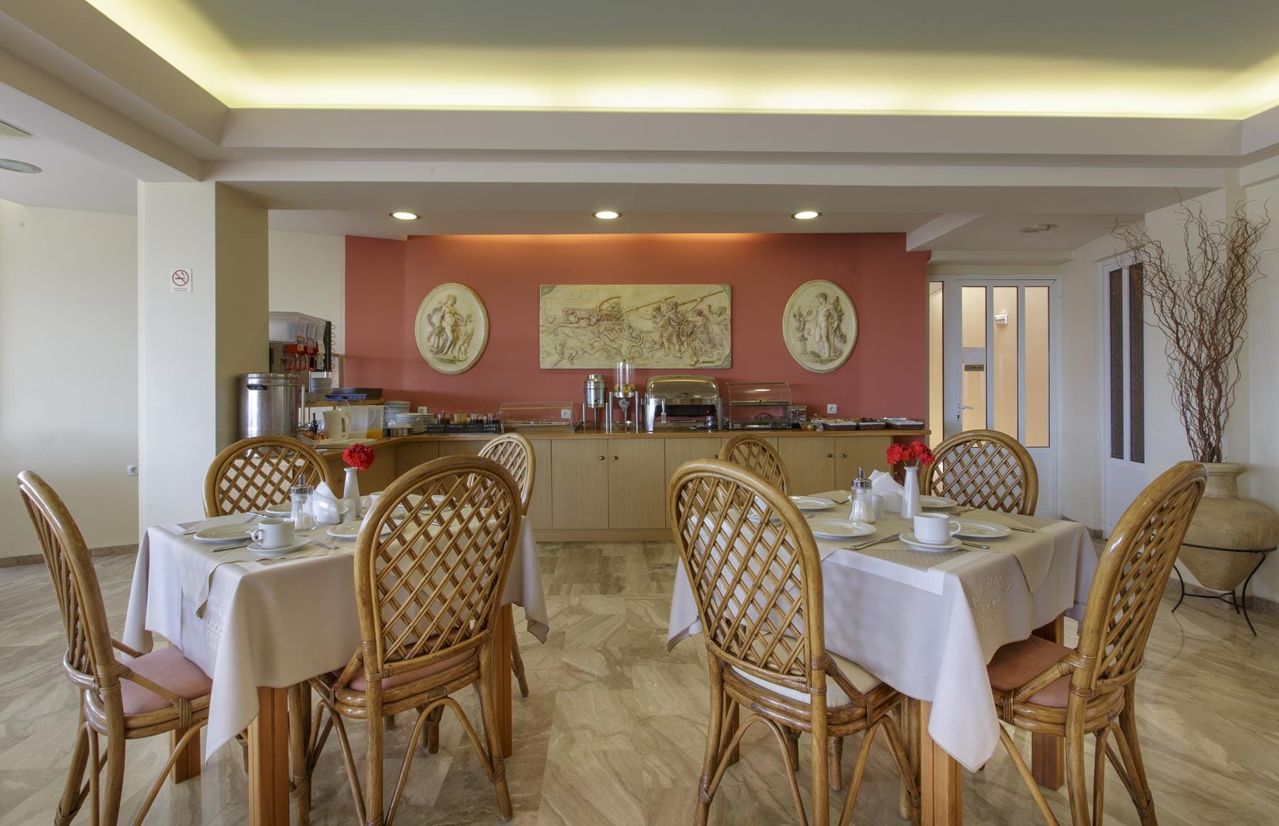 a dining room with a large table set for a meal