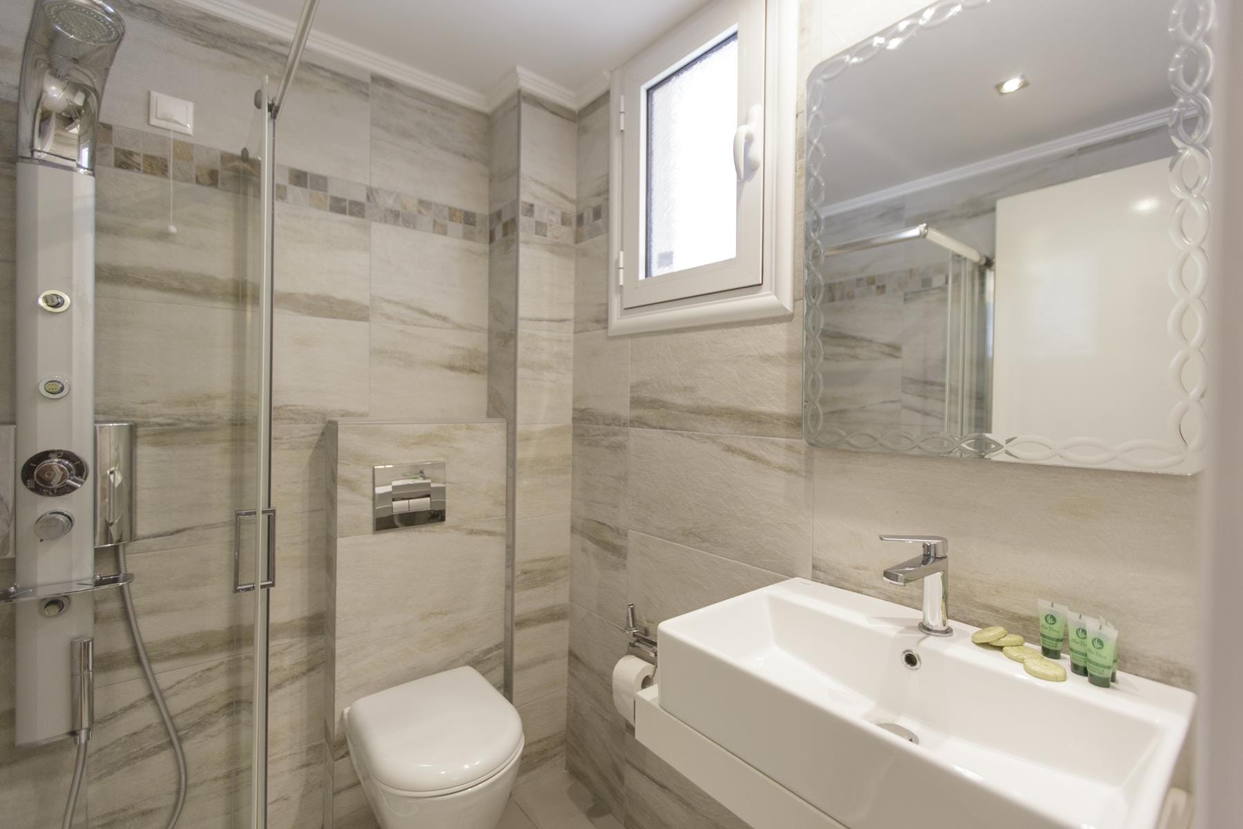 a bathroom with a glass shower