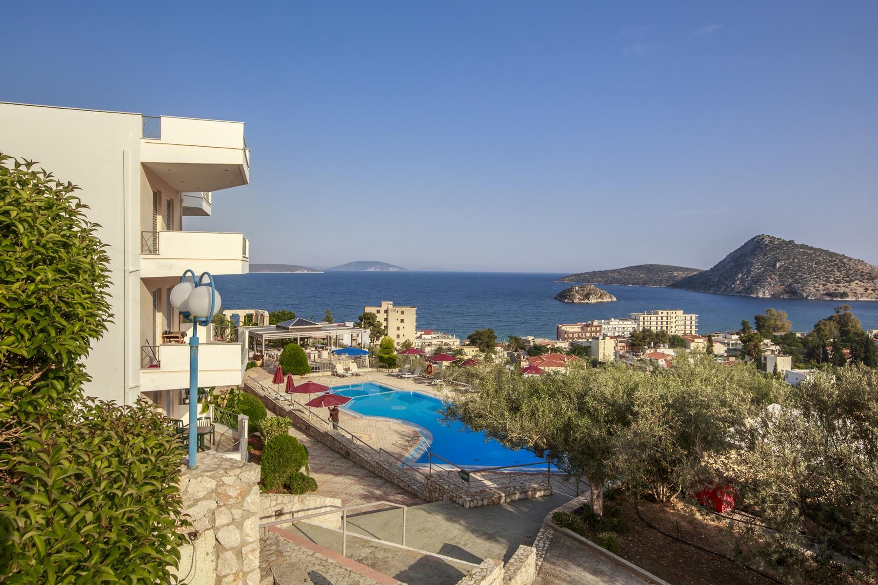 a pool next to a beach