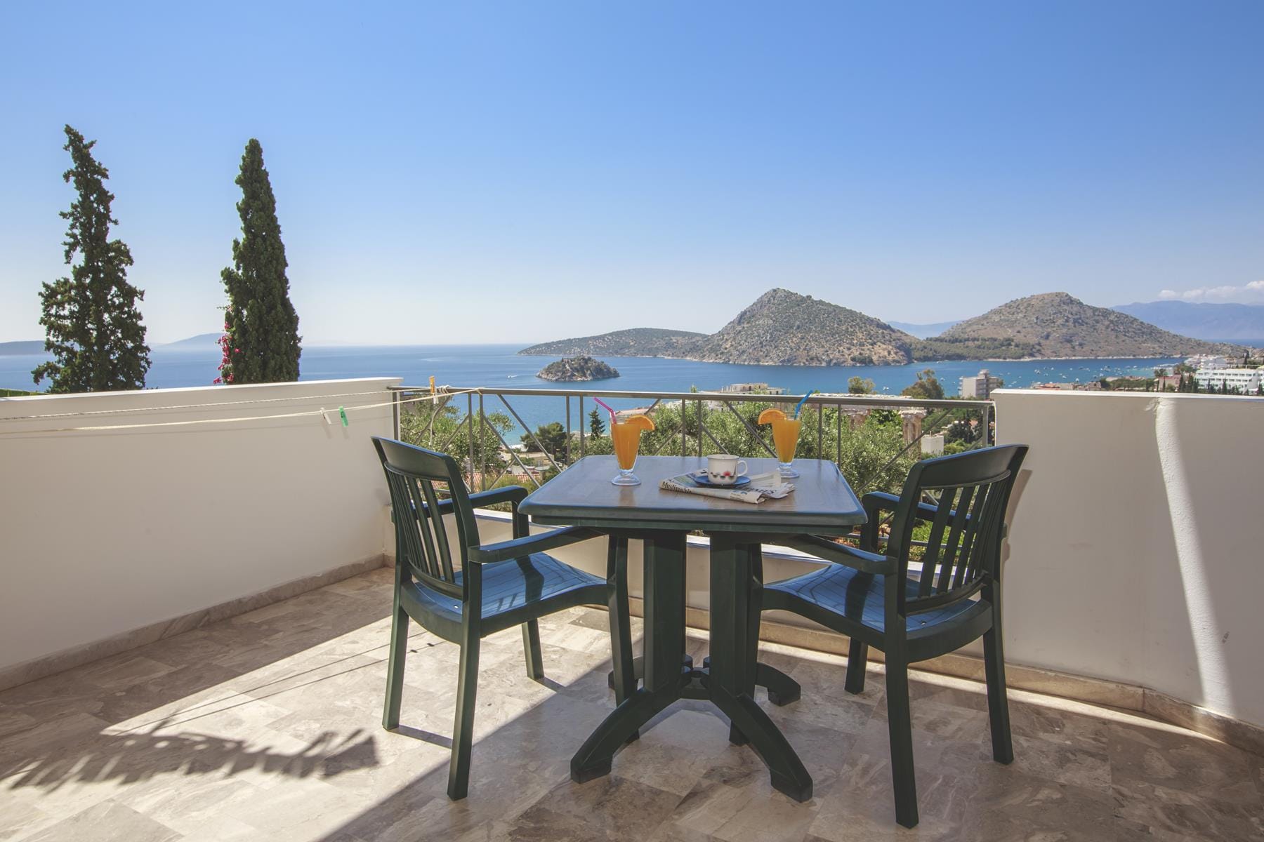 a table and chairs on a deck