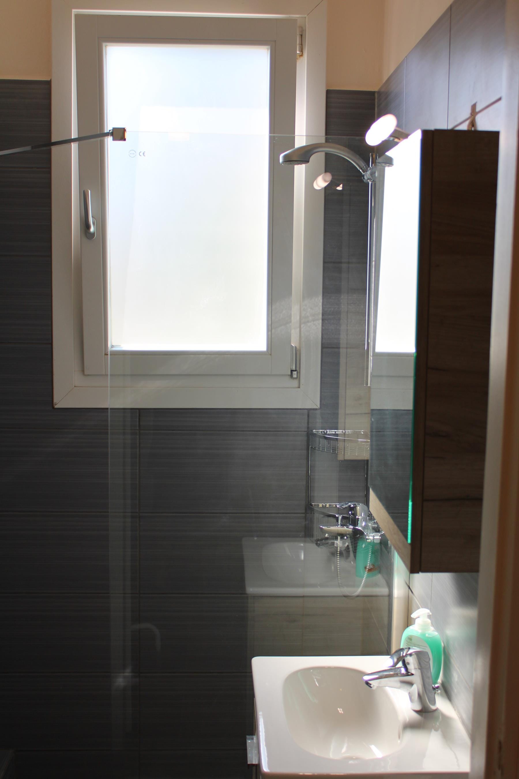 a bathroom with a glass shower
