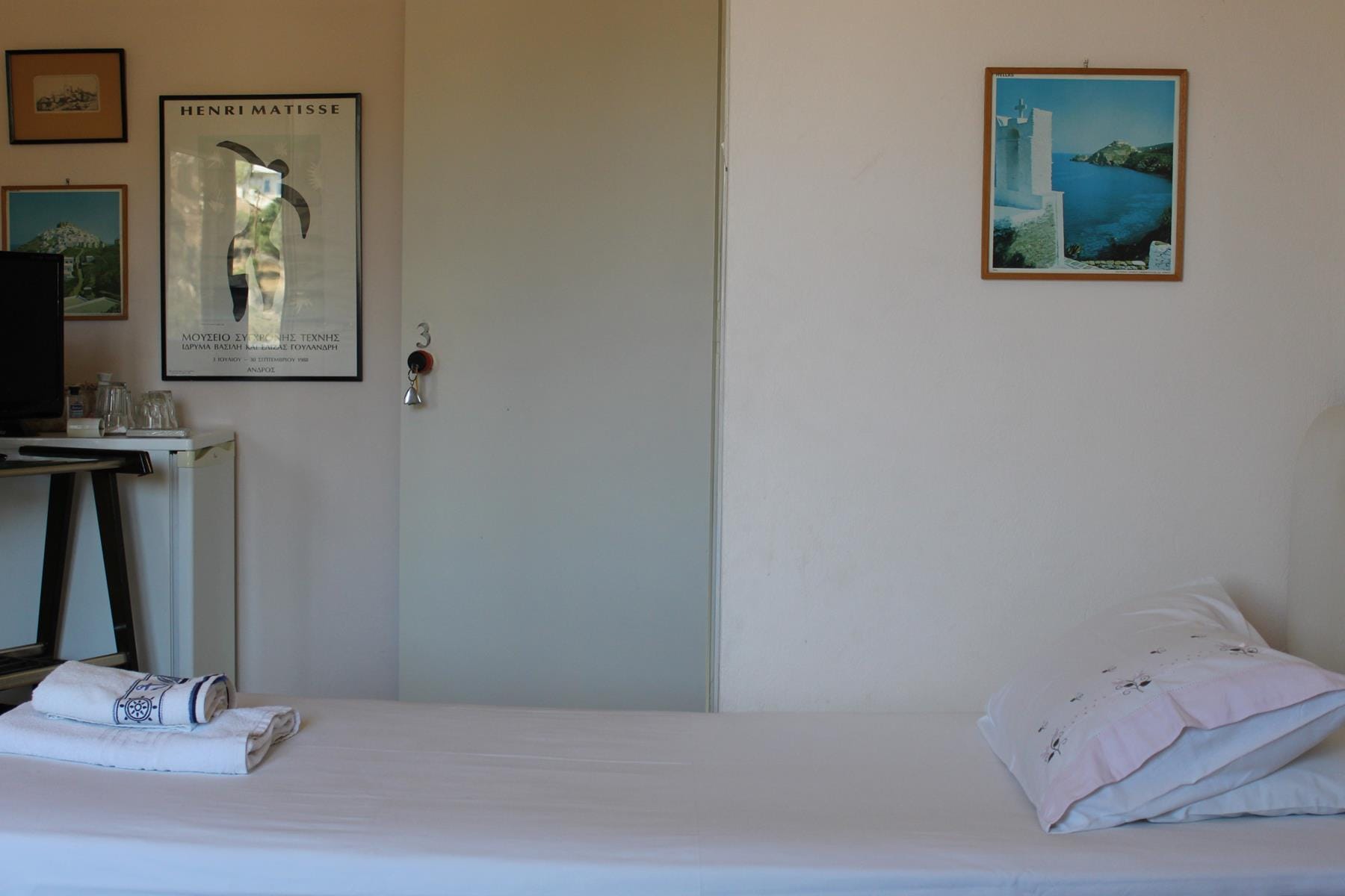 a bed with a white sheet