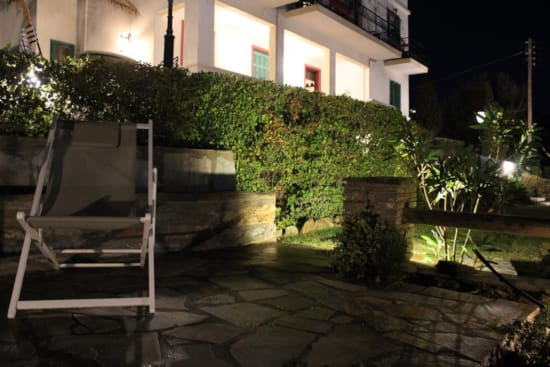 a chair outside by a building