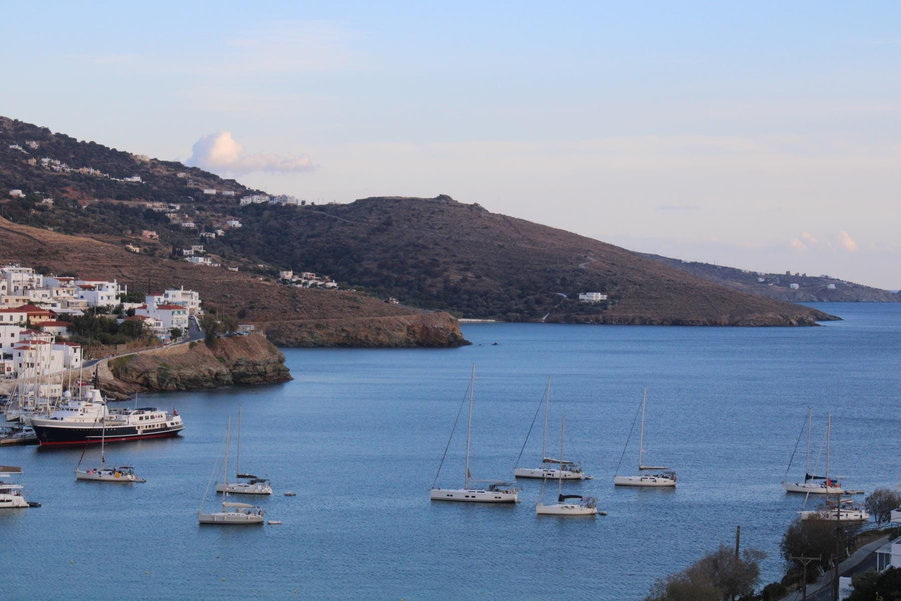 a body of water with boats in it and buildings around it