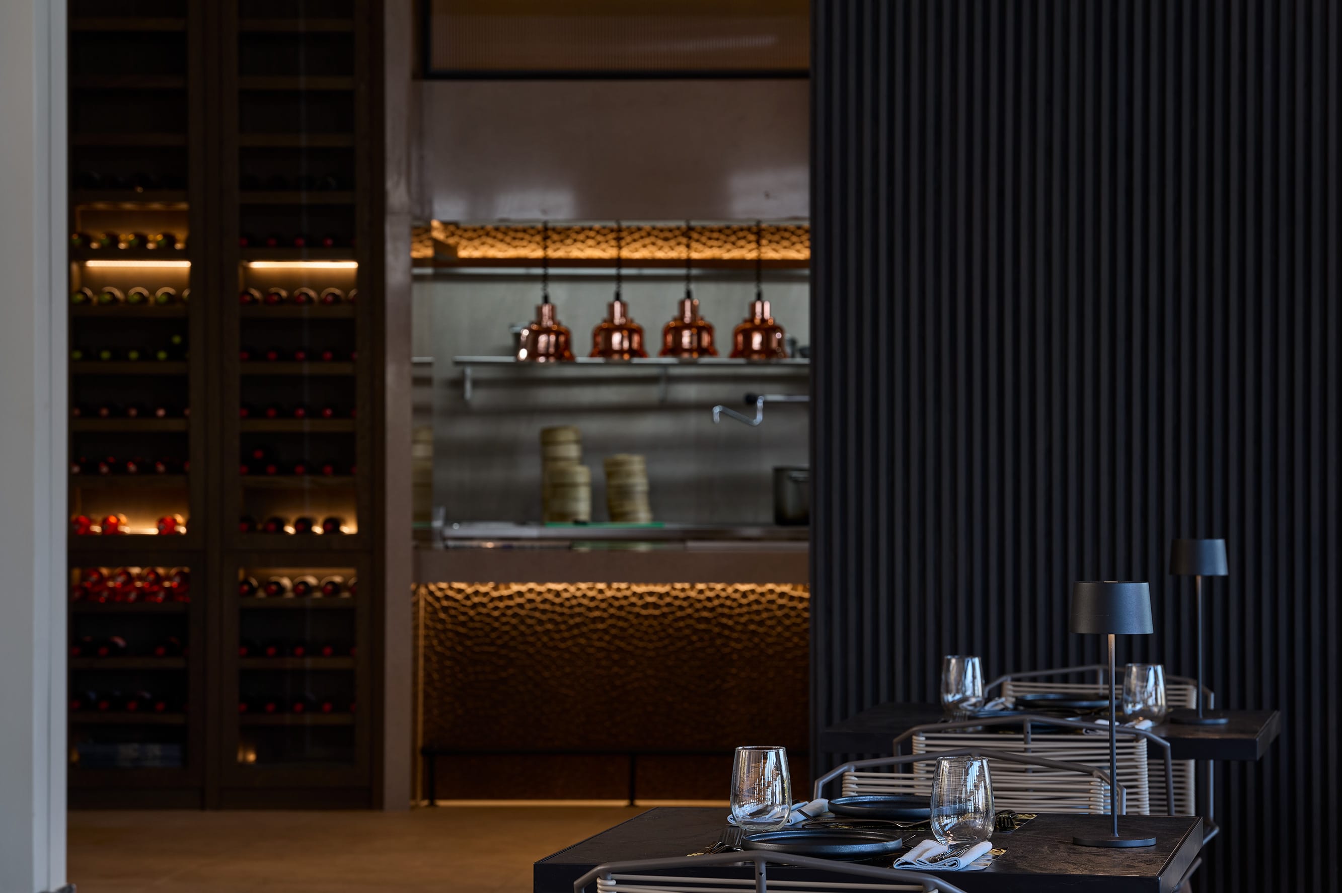 a room with a table and shelves