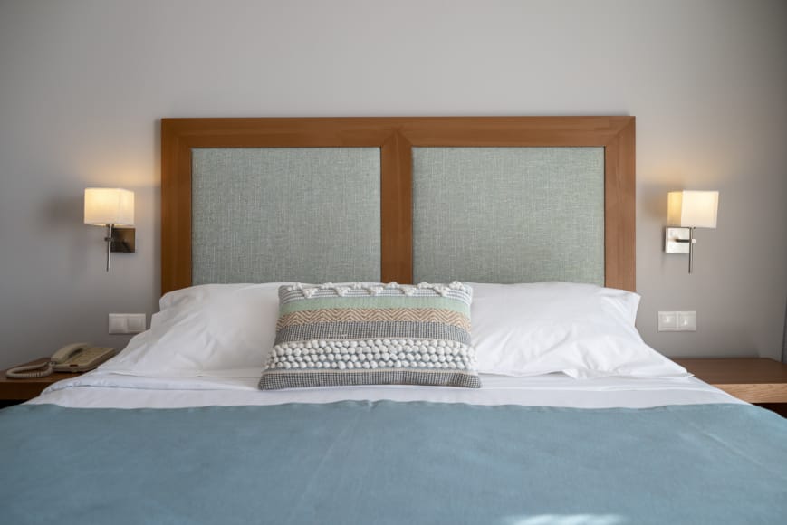 a bed with pillows