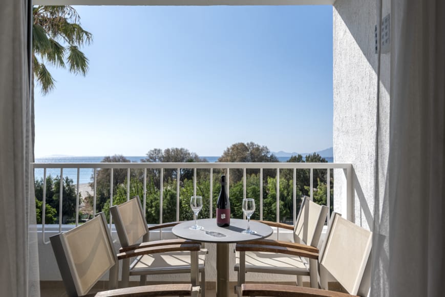a table and chairs on a deck