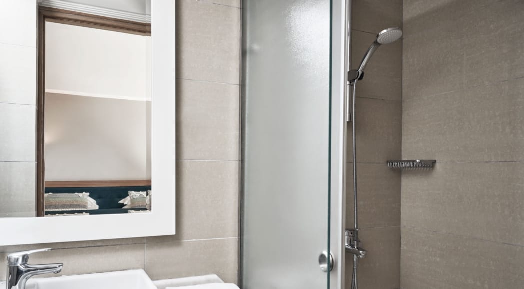 a bathroom with a glass shower