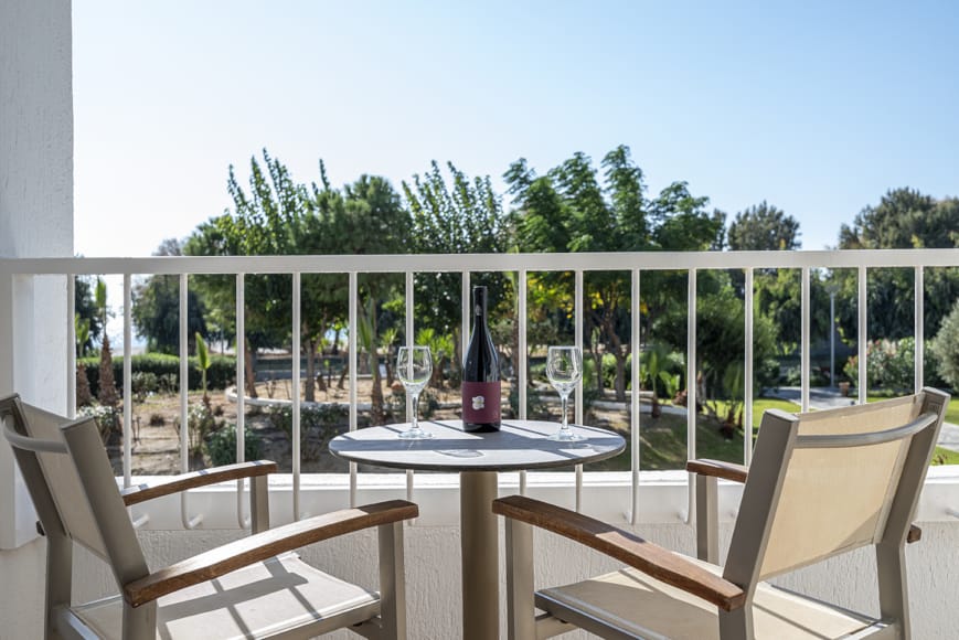 a table and chairs on a deck