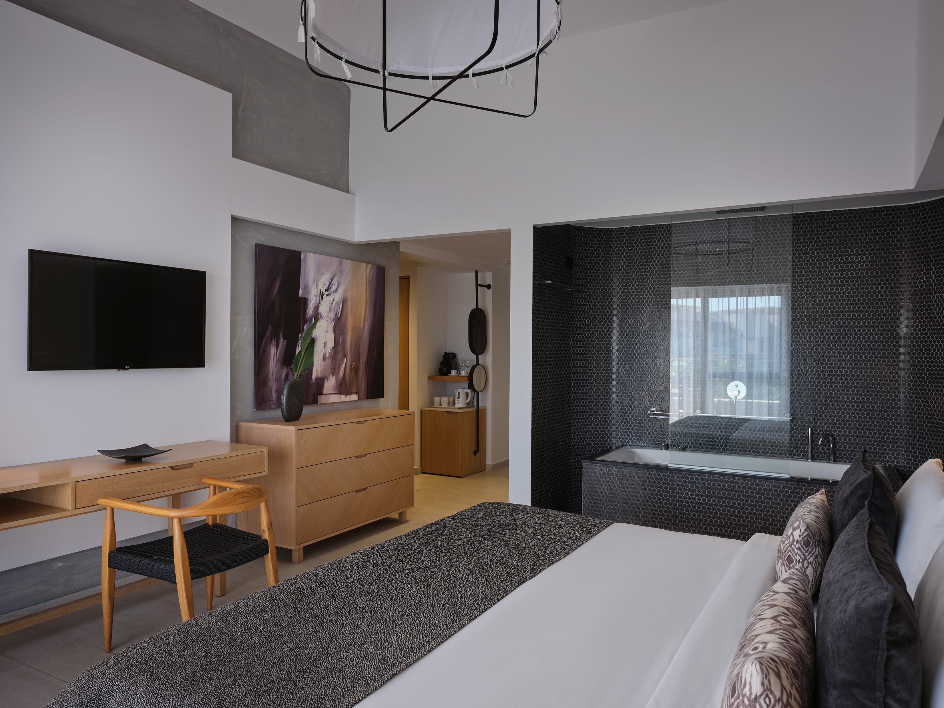 a room with a couch and a tv