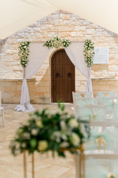 a door with flowers in front of it