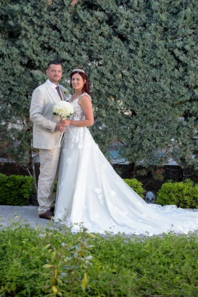 a man and woman posing for a picture