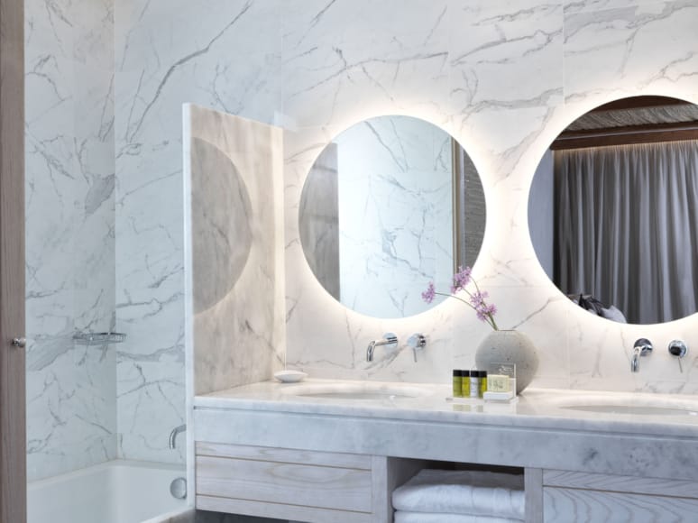 a bathroom with a large mirror