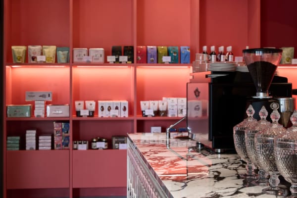 a kitchen with red walls
