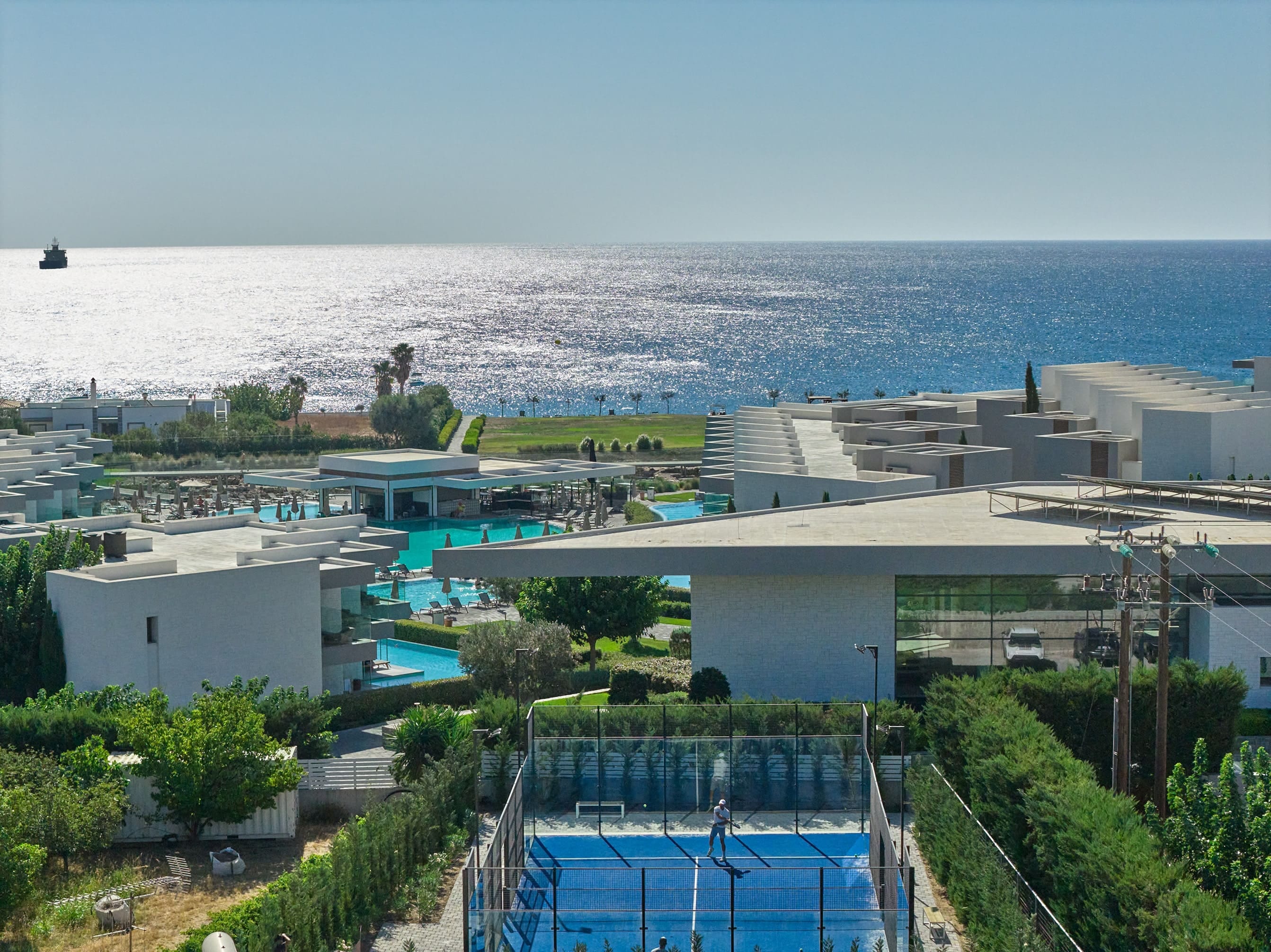 a high angle view of a swimming pool and a beach