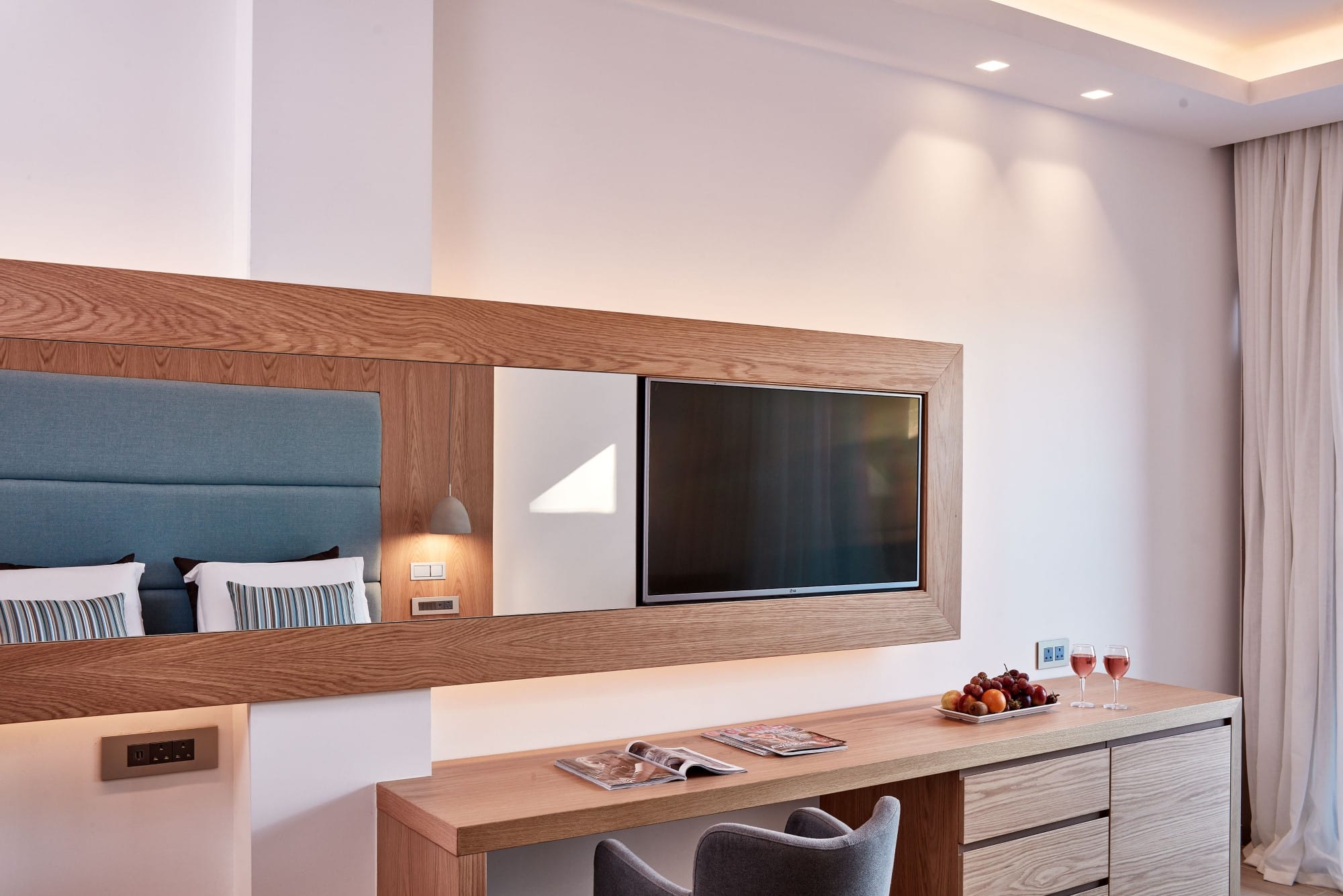 a room with a tv and a table