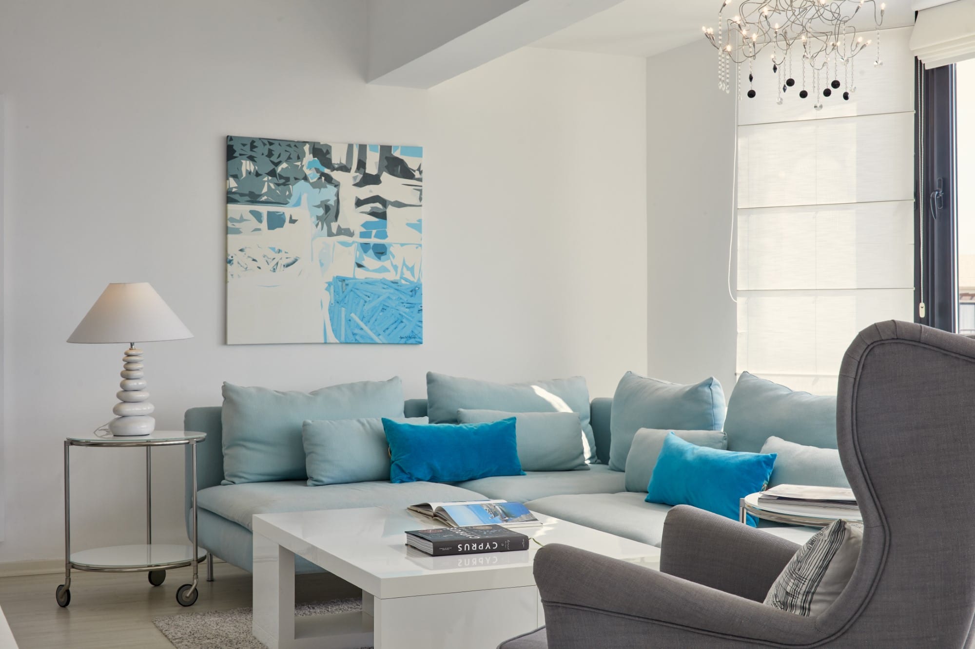 a living room with a couch and a table