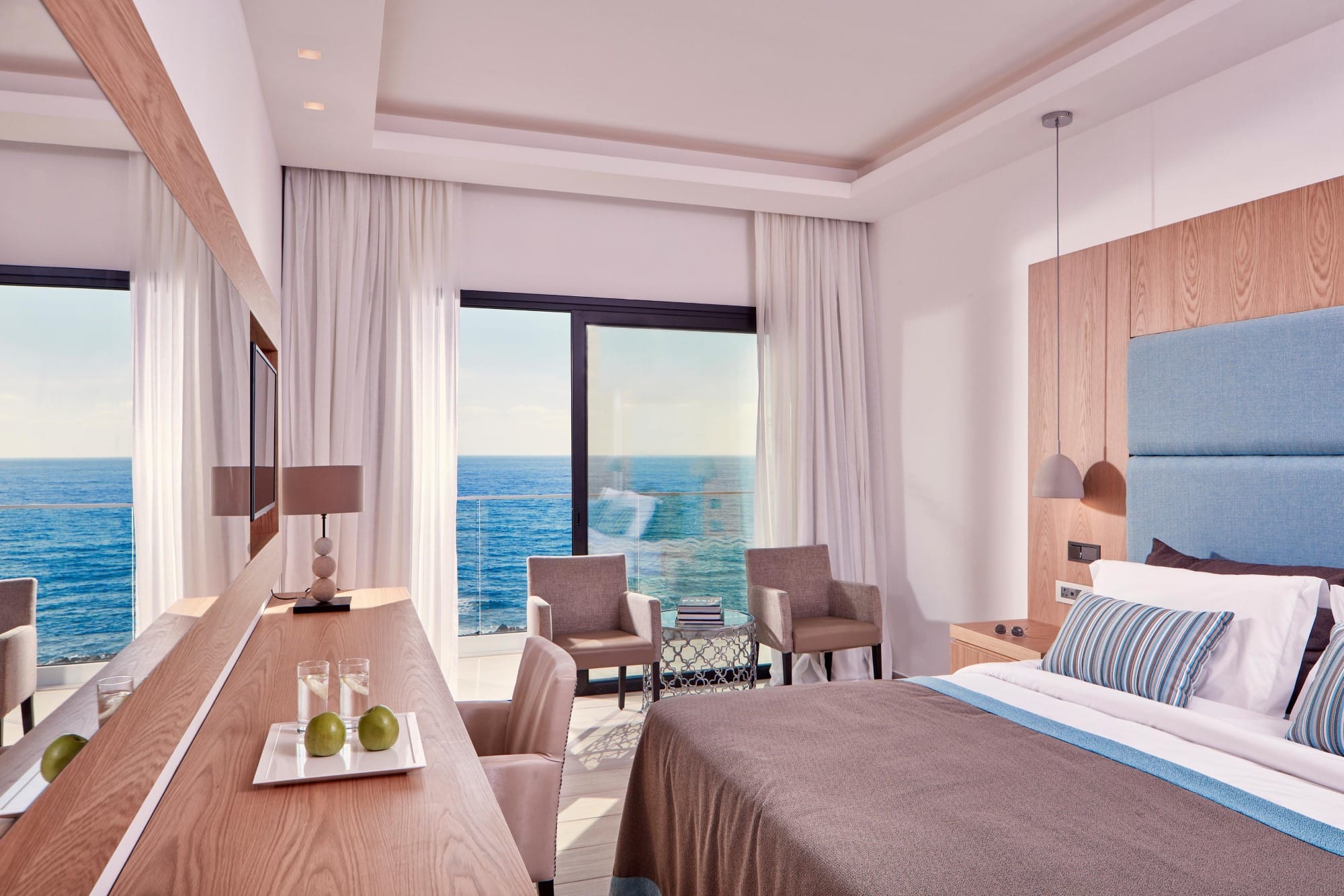 a bedroom with a large window