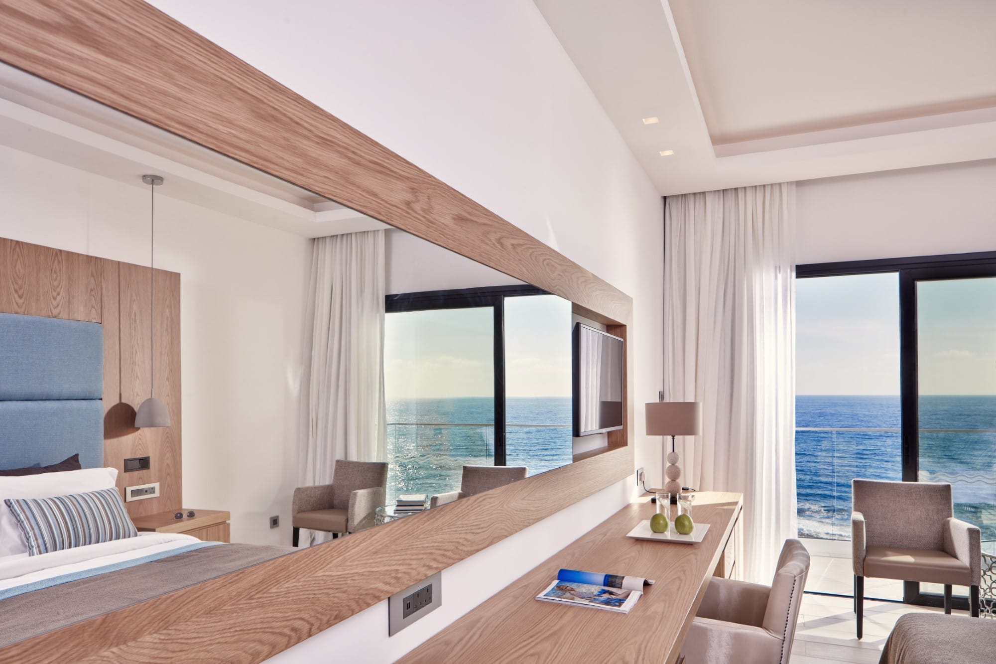 a bedroom with a large window