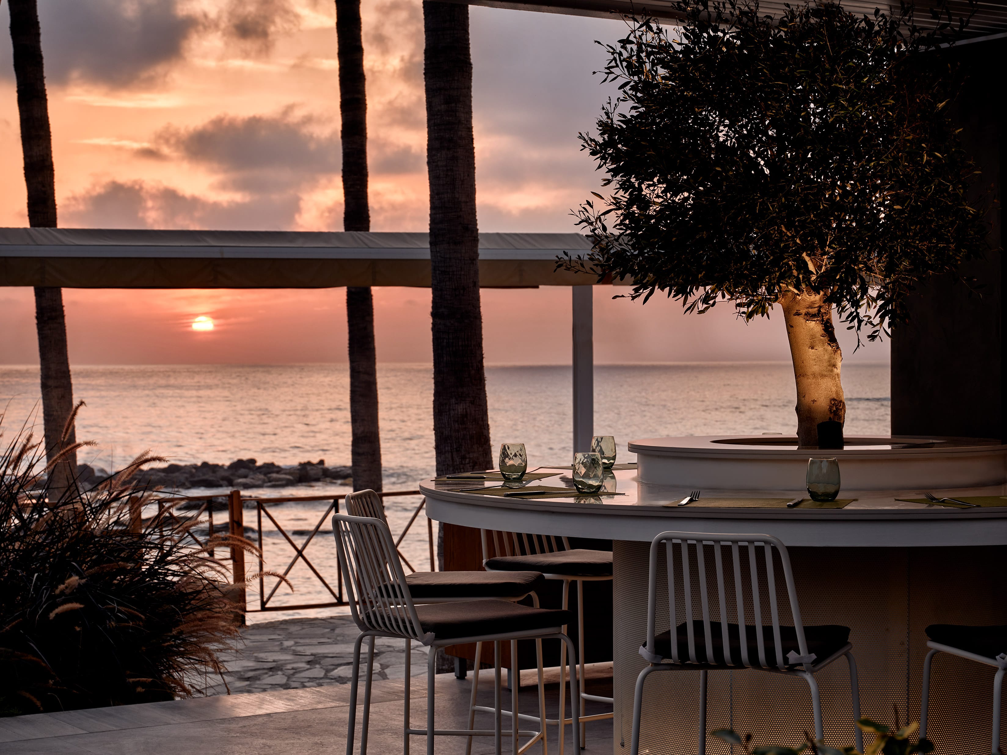 a table and chairs on a deck