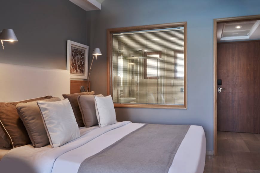 a bed with pillows