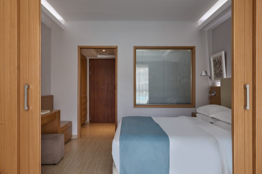 a hotel room with two beds