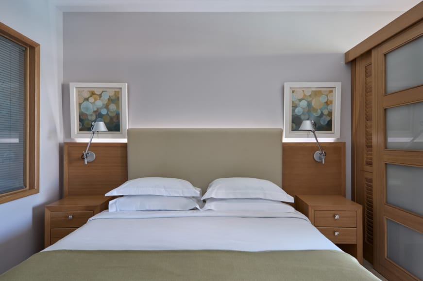 a bed with white sheets