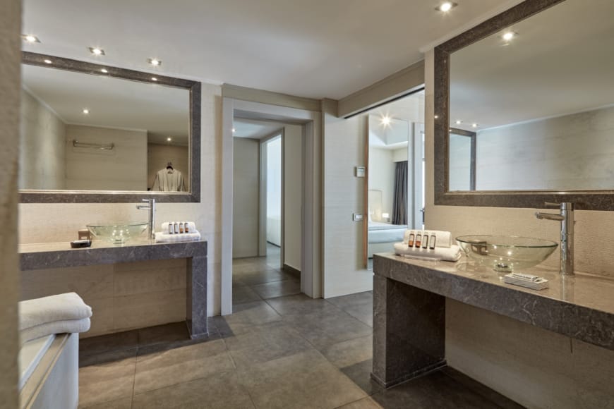 a bathroom with a large mirror