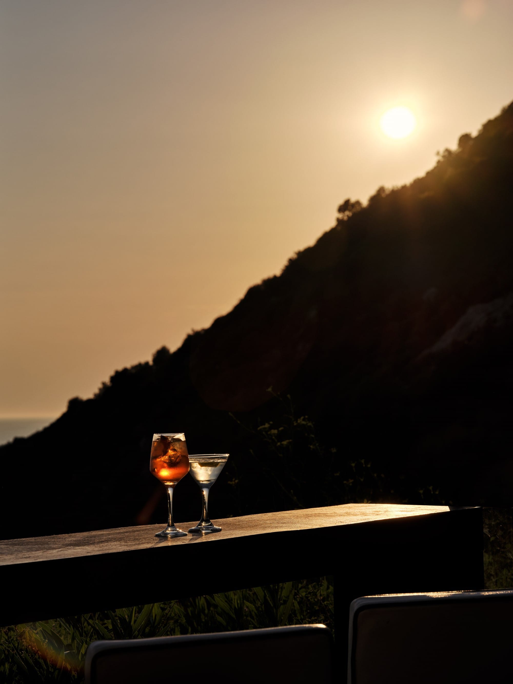 two glasses of wine on a table