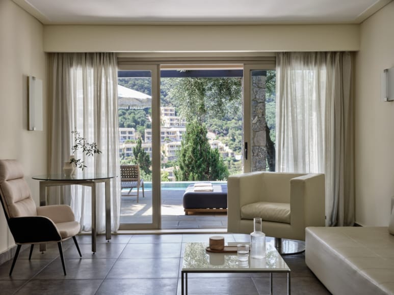 a living room with a large glass door