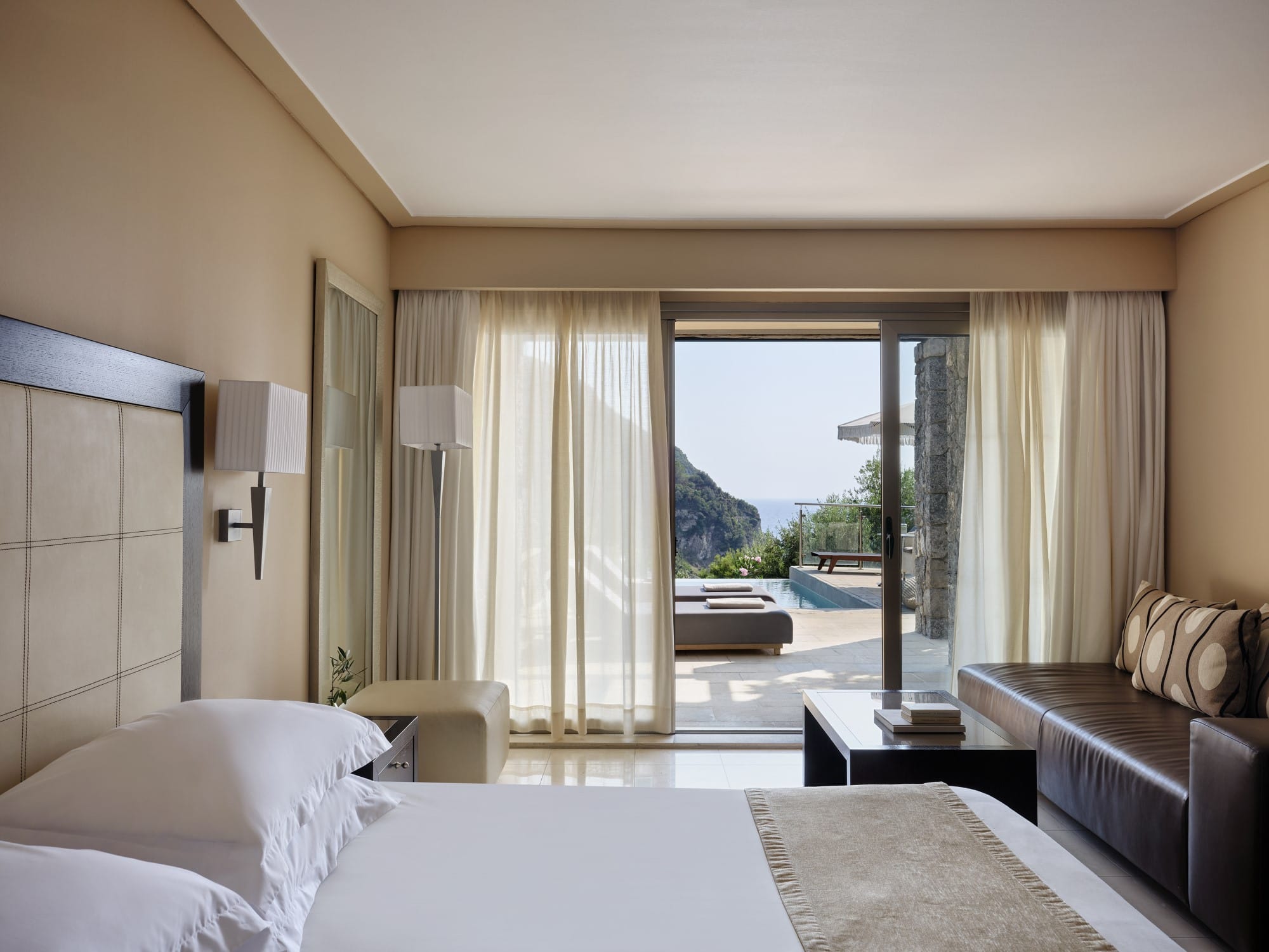 a bedroom with a large window