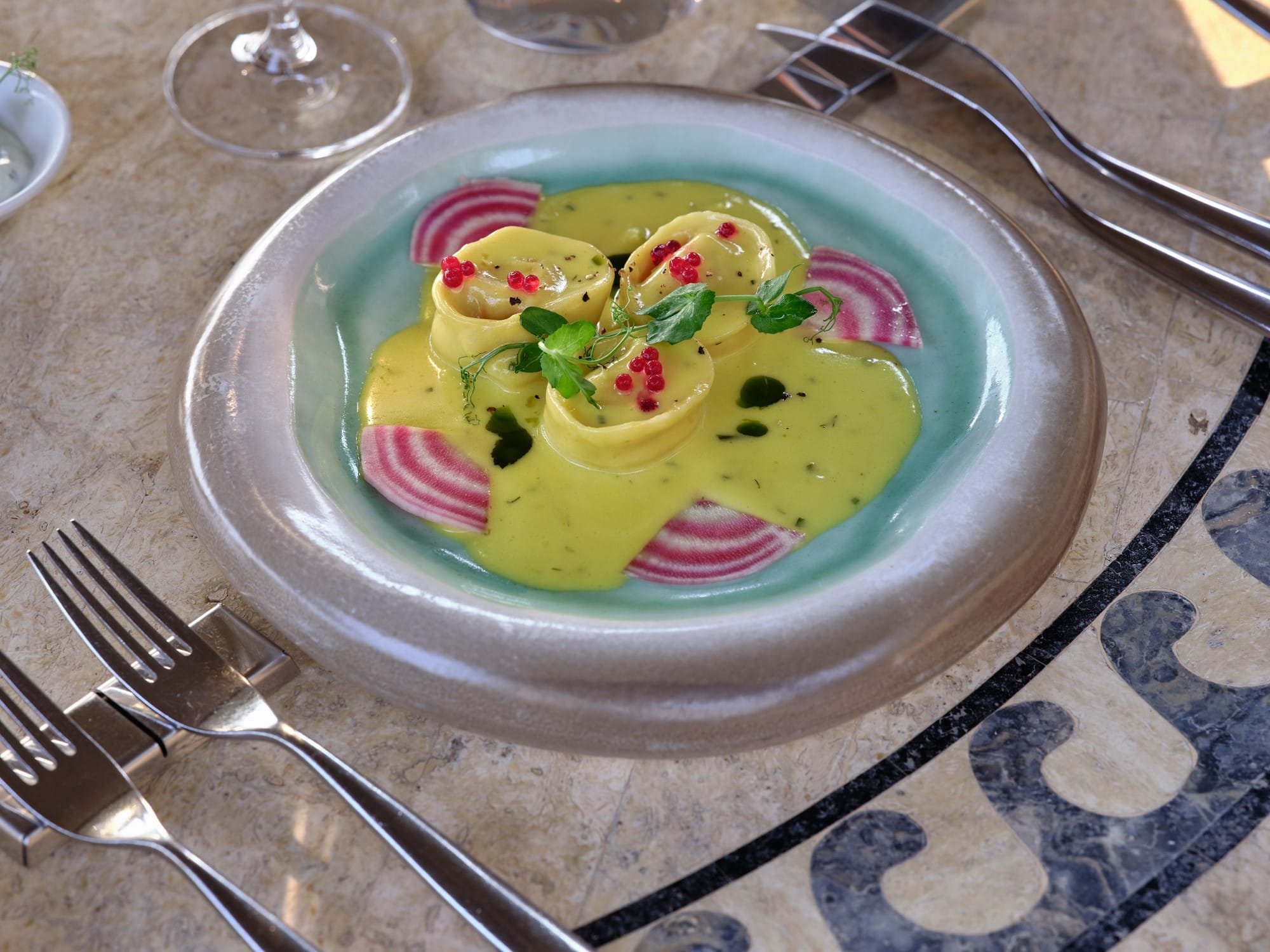 a bowl of soup with a spoon