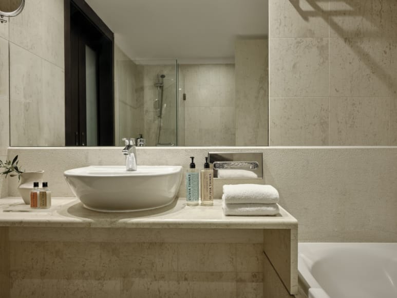 a bathroom with a large mirror