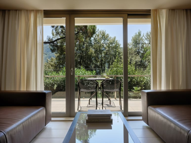 a living room with a large glass door