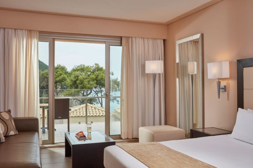 a bedroom with a large window