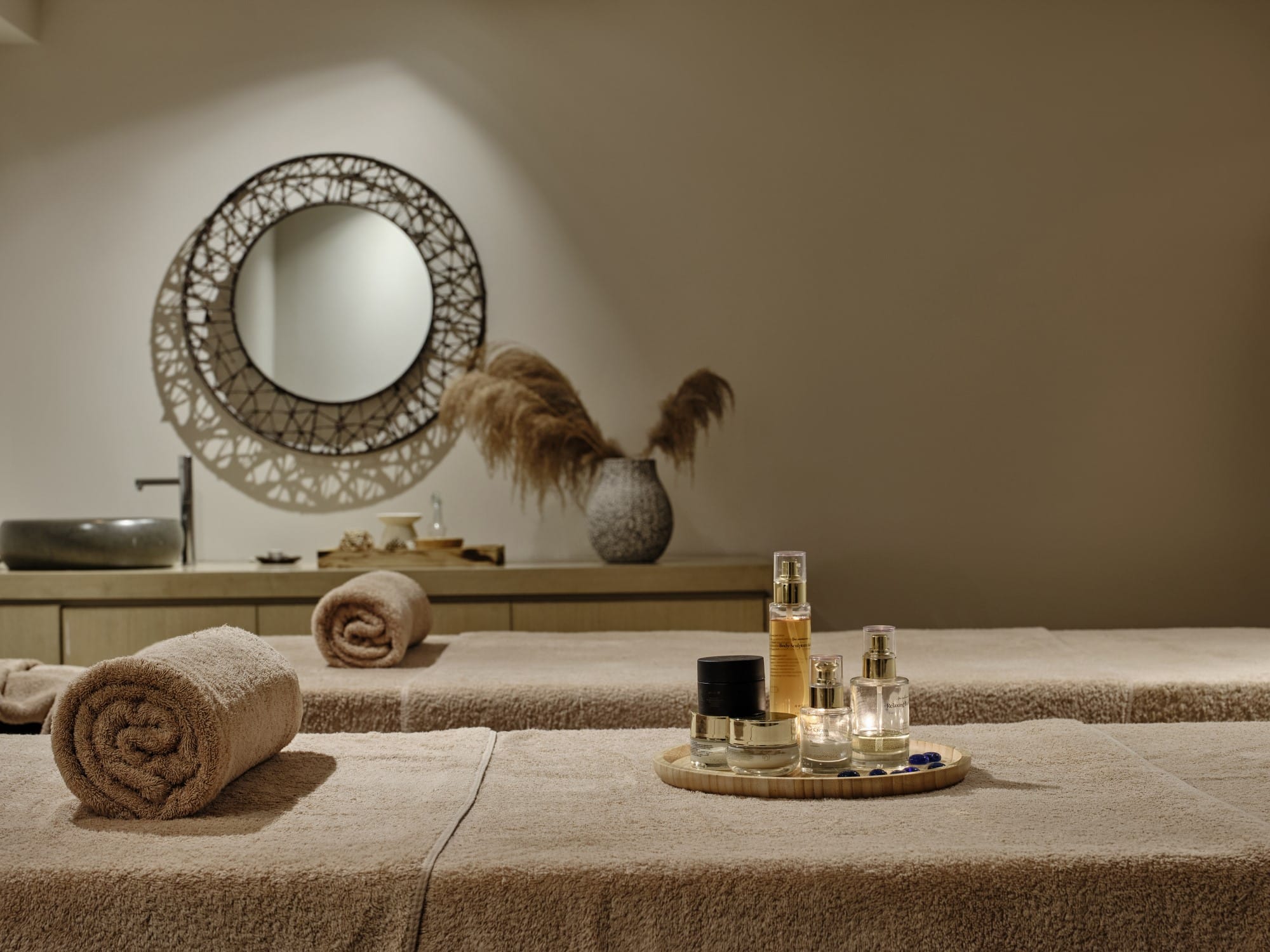 a table with a mirror and a plate of food