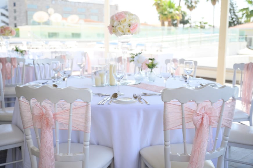 a set dining table with white tables