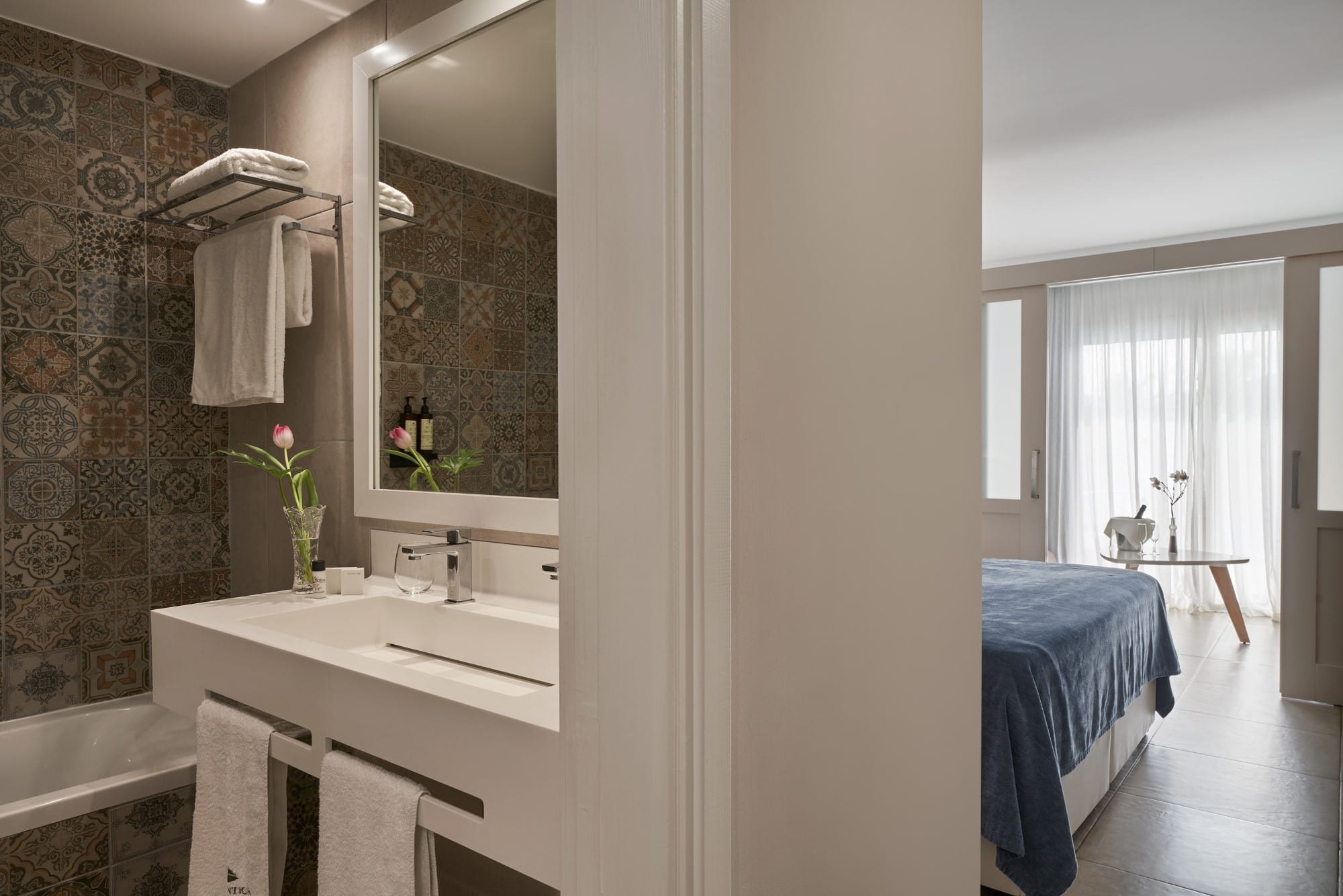 a bathroom with a large mirror