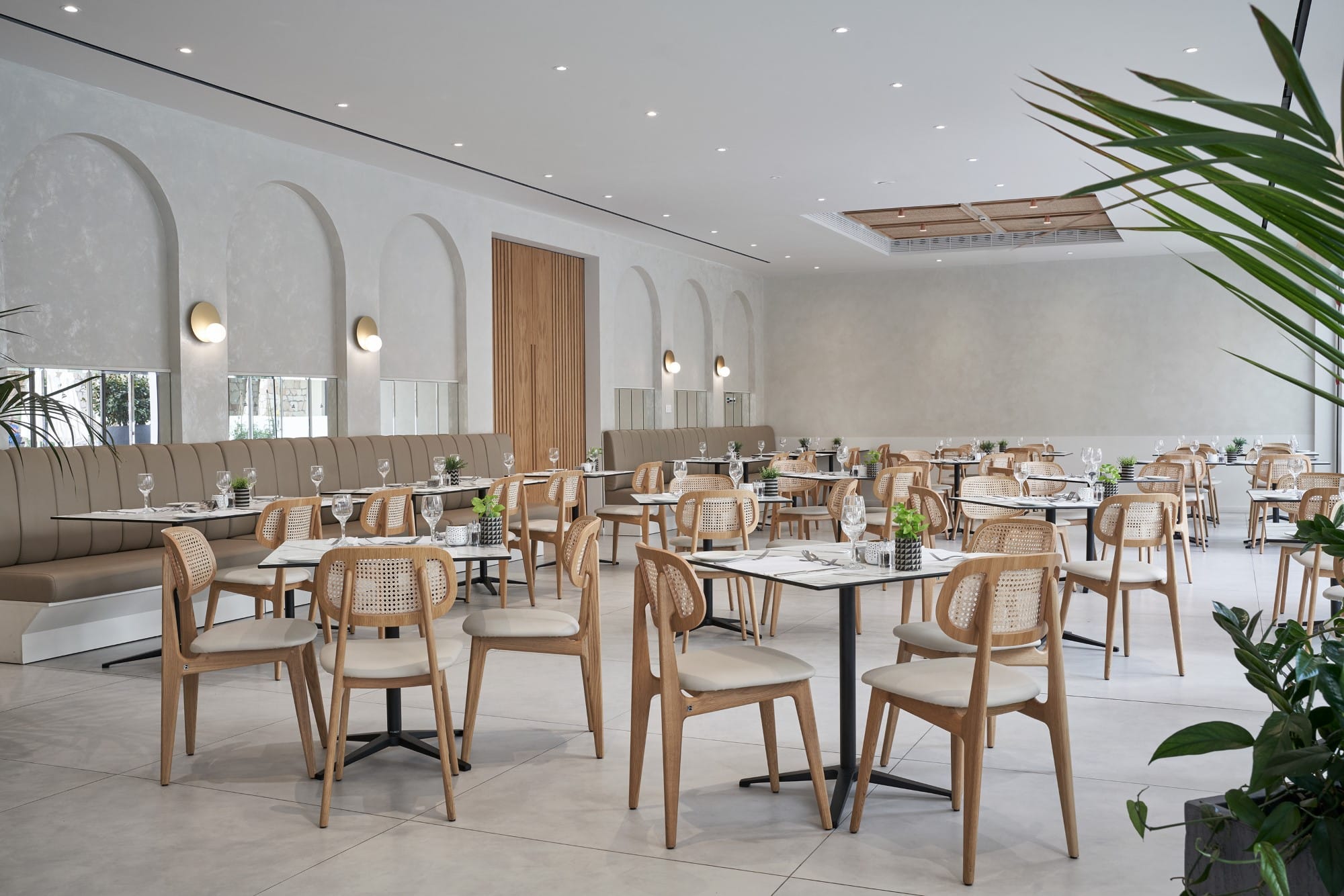 a room with tables and chairs